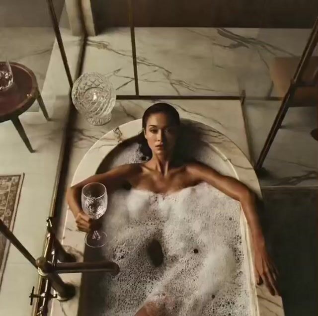 Cinematic Bathroom Scene: Woman Reclining in Bathtub (Part 1)